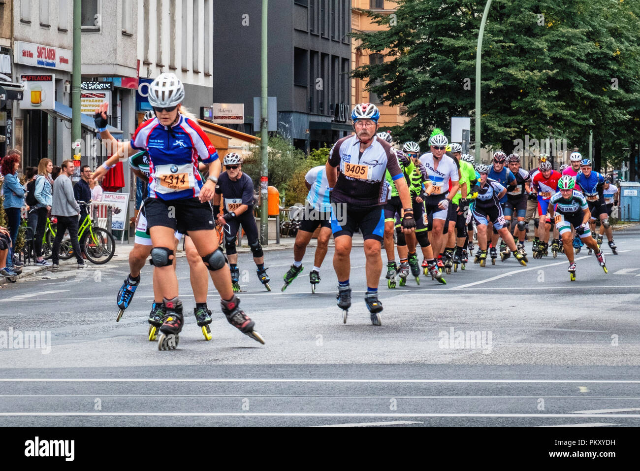 Berlin Germany, 15 September 2018. Annual Inline Skating Marathon. In line skaters pass through Rosenthaler Platz as they compete in the annual roller skating event. The event is the Grand Finale of the Inline skating season as skaters participants from 60 countries compete for the WORLD and GERMAN INLINE CUP Credit: Eden Breitz/Alamy Live News Stock Photo