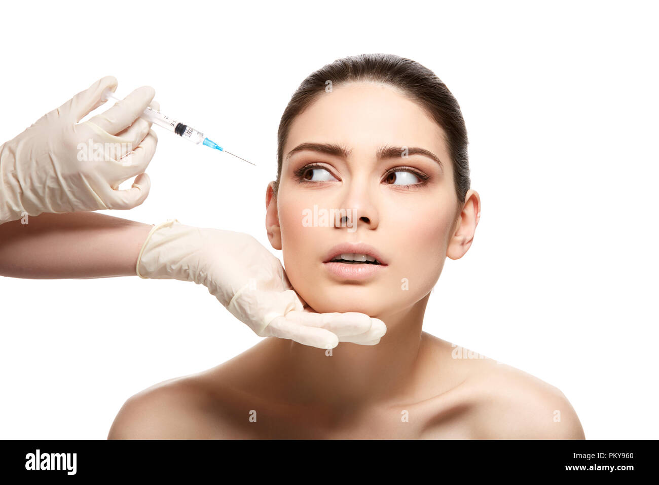 beautiful young woman with natural makeup getting face collagen ...