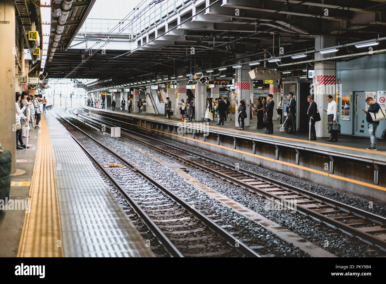 Kinshicho, Tokyo/Japan - June 22, 2018: Abstract blur view of people waiting for train in Tokyo, Japan Stock Photo