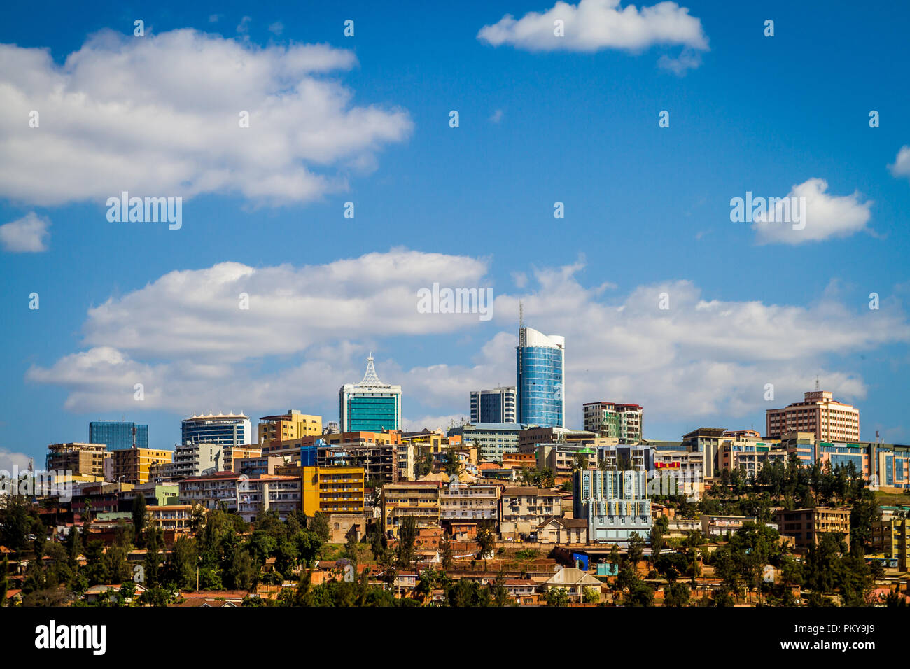The downtown Kigali skyline on a sunny summer day with blue skies. Stock Photo