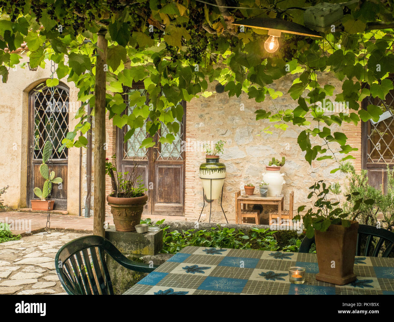 Patio area outside an Agriturismo apartment in Tuscany, Italy Stock