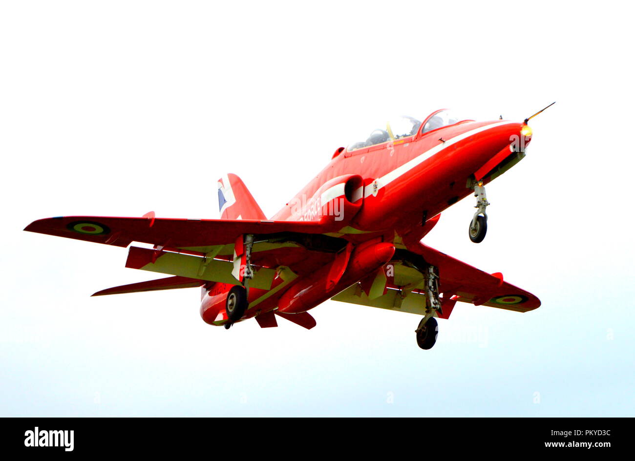 RAF Red Arrow about to land at Hawarden Airport with wheels down Stock Photo