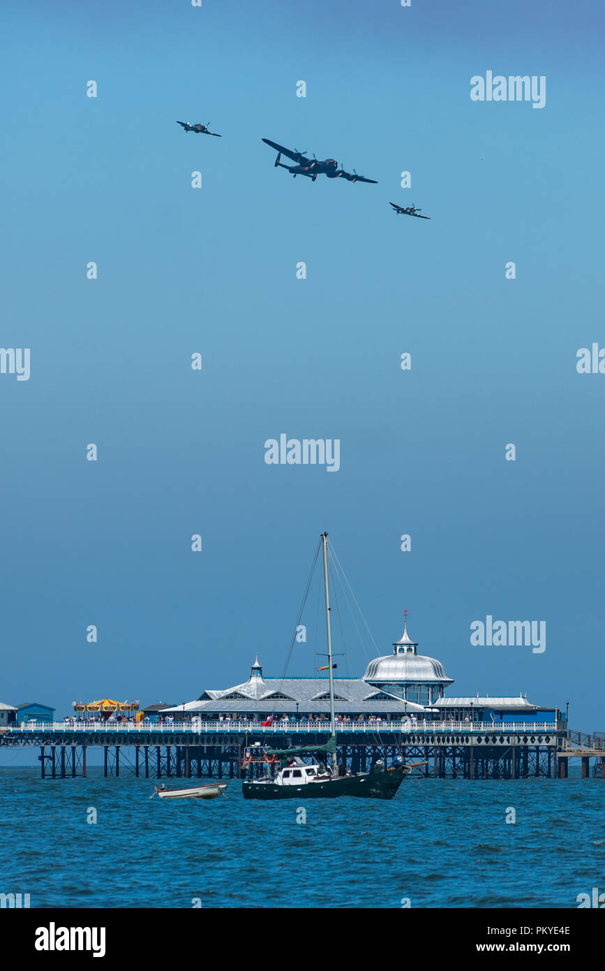The Battle of Britain Memorial flight pass over Llandudno Pier on Armed Forces Day Stock Photo