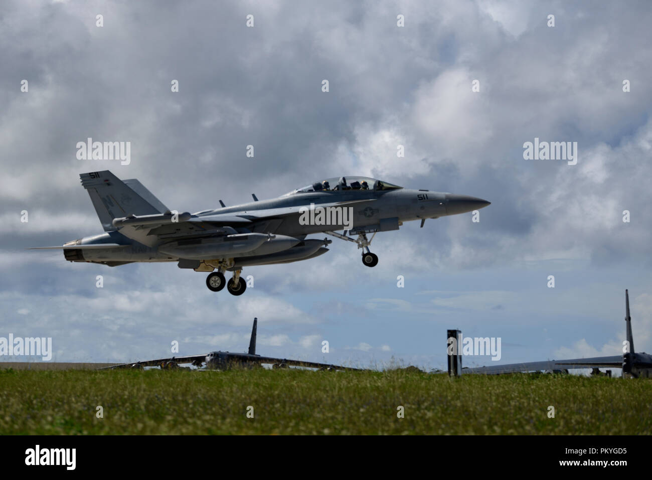 A U.S. Navy E/A-18G Growler assigned to the 'Yellow Jackets' of Electronic Attack Squadron (VAQ) 138 takes off in preparation for exercise Valiant Shield 2018 Sept. 7, 2018, at Andersen Air Force Base, Guam. Valiant Shield is a biennial, U.S. only, field training exercise with a focus on integration of joint training among U.S. forces. (U.S. Air Force photo by Airman 1st Class Gerald R. Willis) Stock Photo