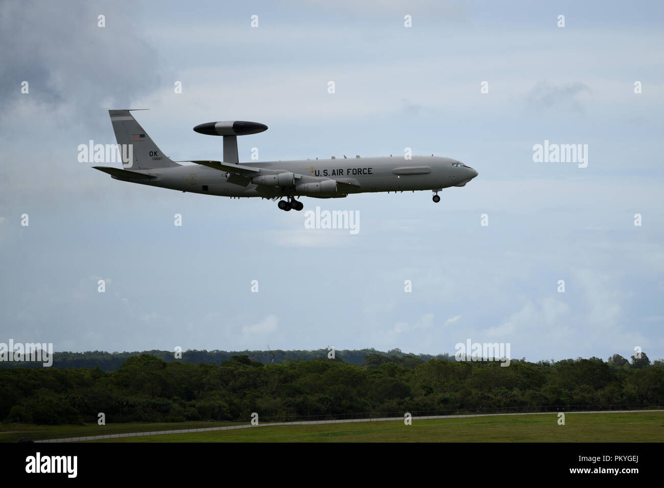 A U.S. Air Force E-3 Sentry touches down on Andersen Air Force Base, Guam, Sept. 12th, 2018. The aircraft is set to participate in exercise Valiant Shield 2018. Valiant Shield is a biennial, U.S. only, field training exercise with a focus on integration of joint training among U.S. forces. (U.S. Air Force photo by Senior Airmen Gerald R. Willis) Stock Photo