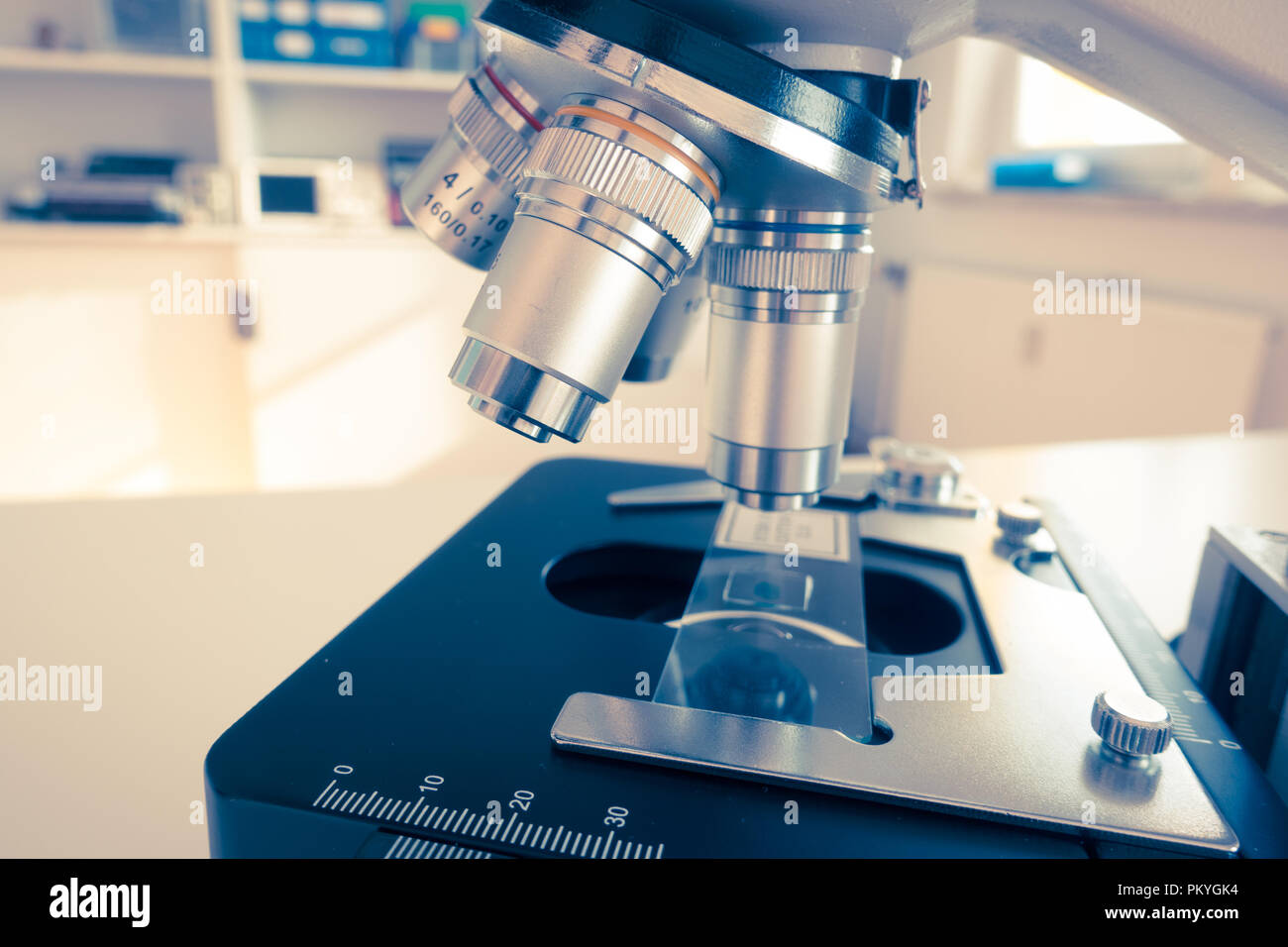 Slide and lens of microscope Stock Photo Alamy