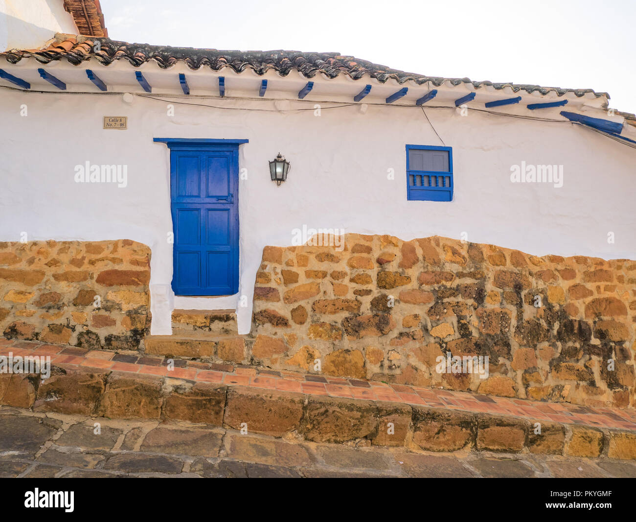 Barichara, Colombia, Santander, colonial street with white historic buildings door and widow Stock Photo