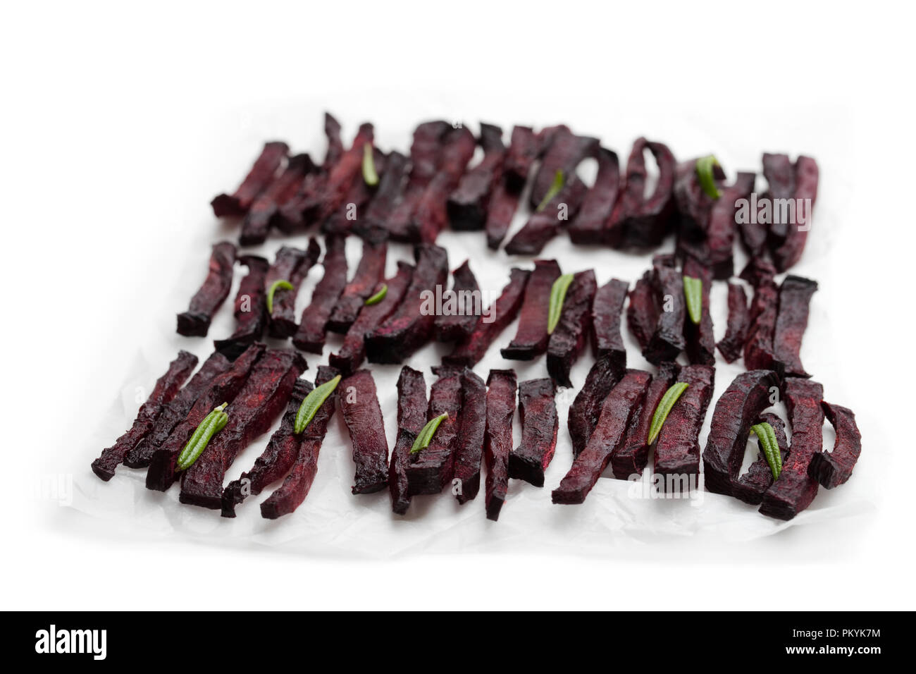 Homemade oven baked beetroot chips isolated on white Stock Photo Alamy