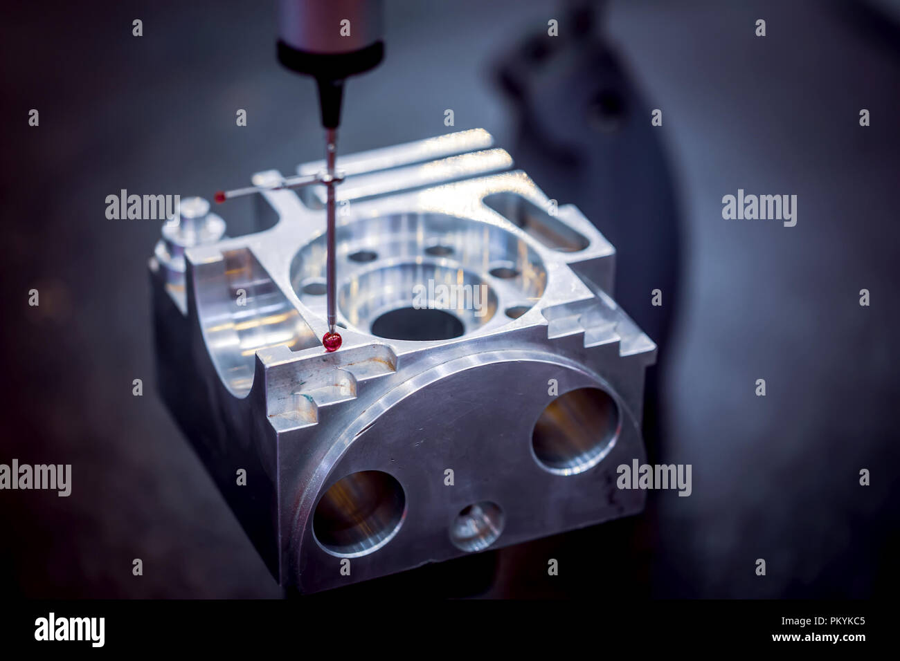 Quality control measurement probe. Metalworking CNC milling machine. Cutting metal modern processing technology. Small depth of field. Warning - authe Stock Photo
