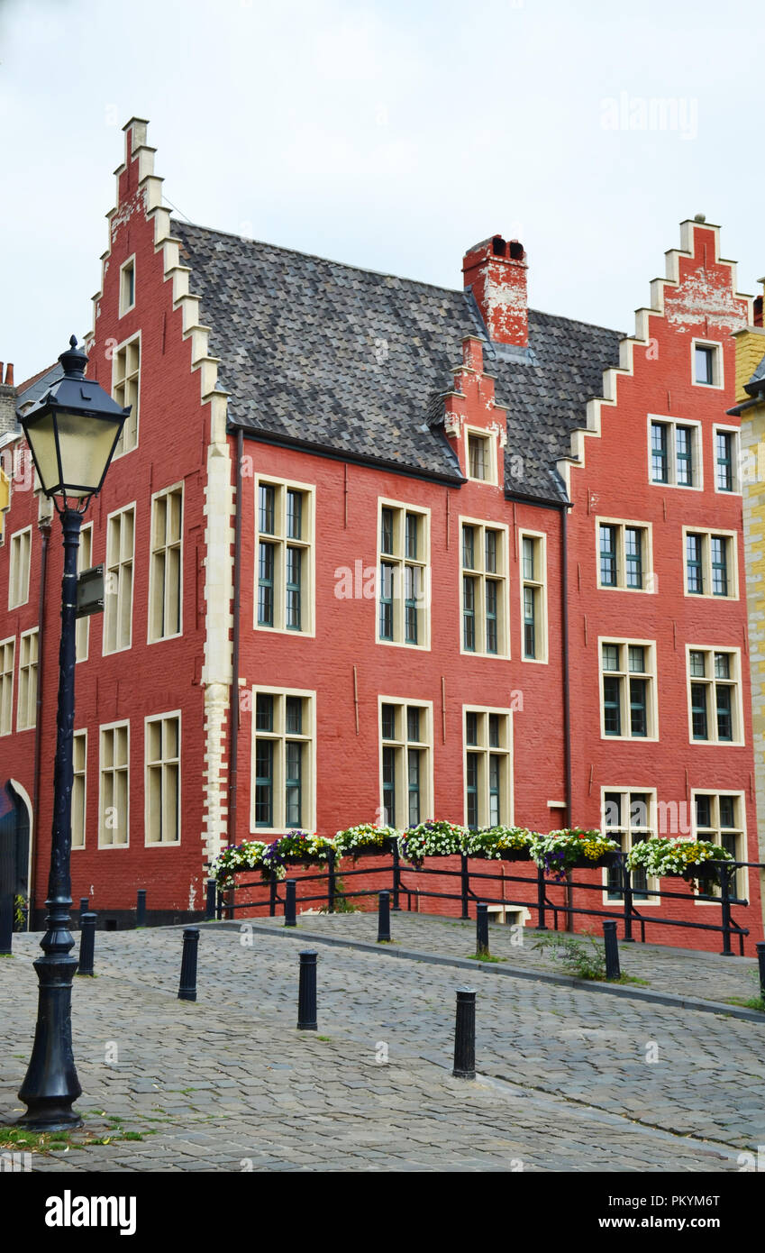 Old buildings, bridge and canal in the center of Ghent, Belgium Stock Photo