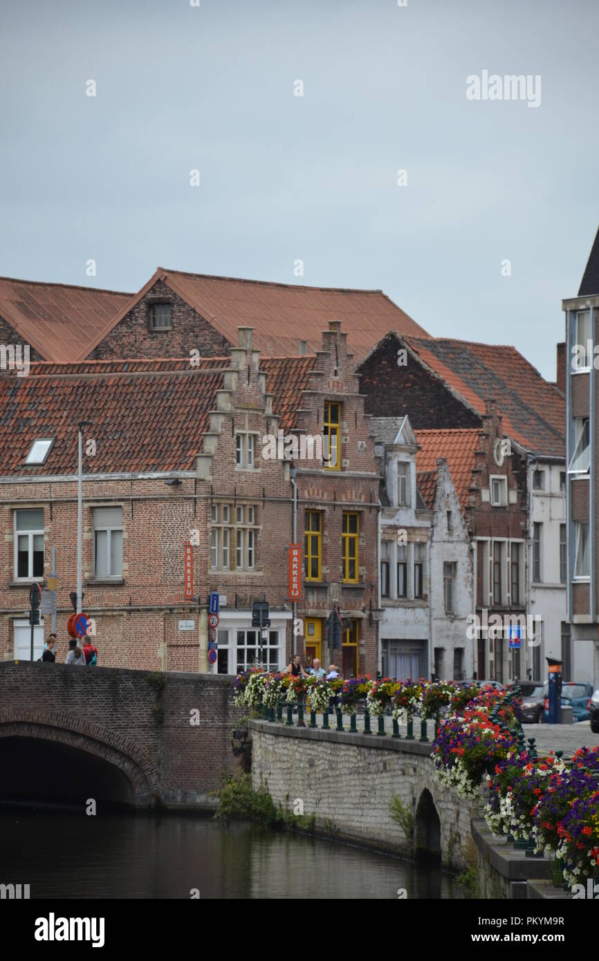 Old buildings, bridge and canal in the center of Ghent, Belgium Stock Photo