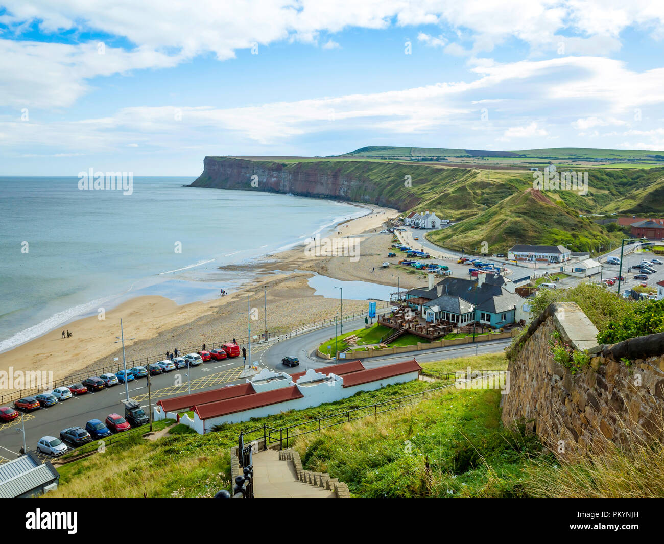 Saltburn by the Sea view from the cliff above the pier southwards to Warsett Hill and imposing Huntcliff Stock Photo