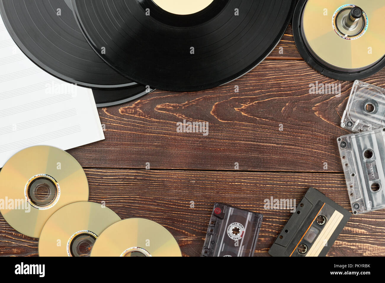 Frame from vintage musical discs and records. Vinyl records, compact