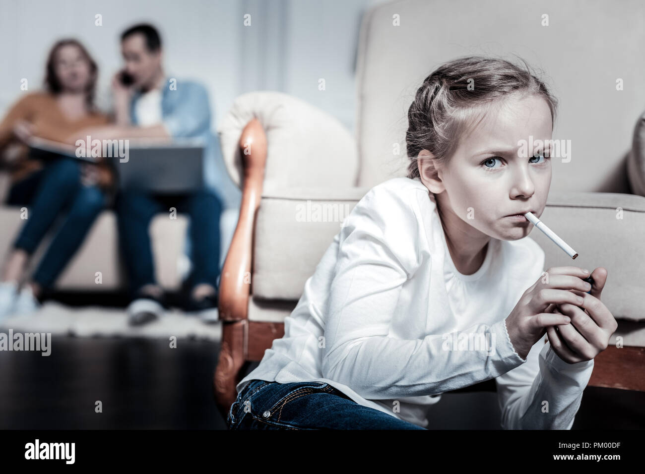 Child smoking cigarette hi-res stock photography and images