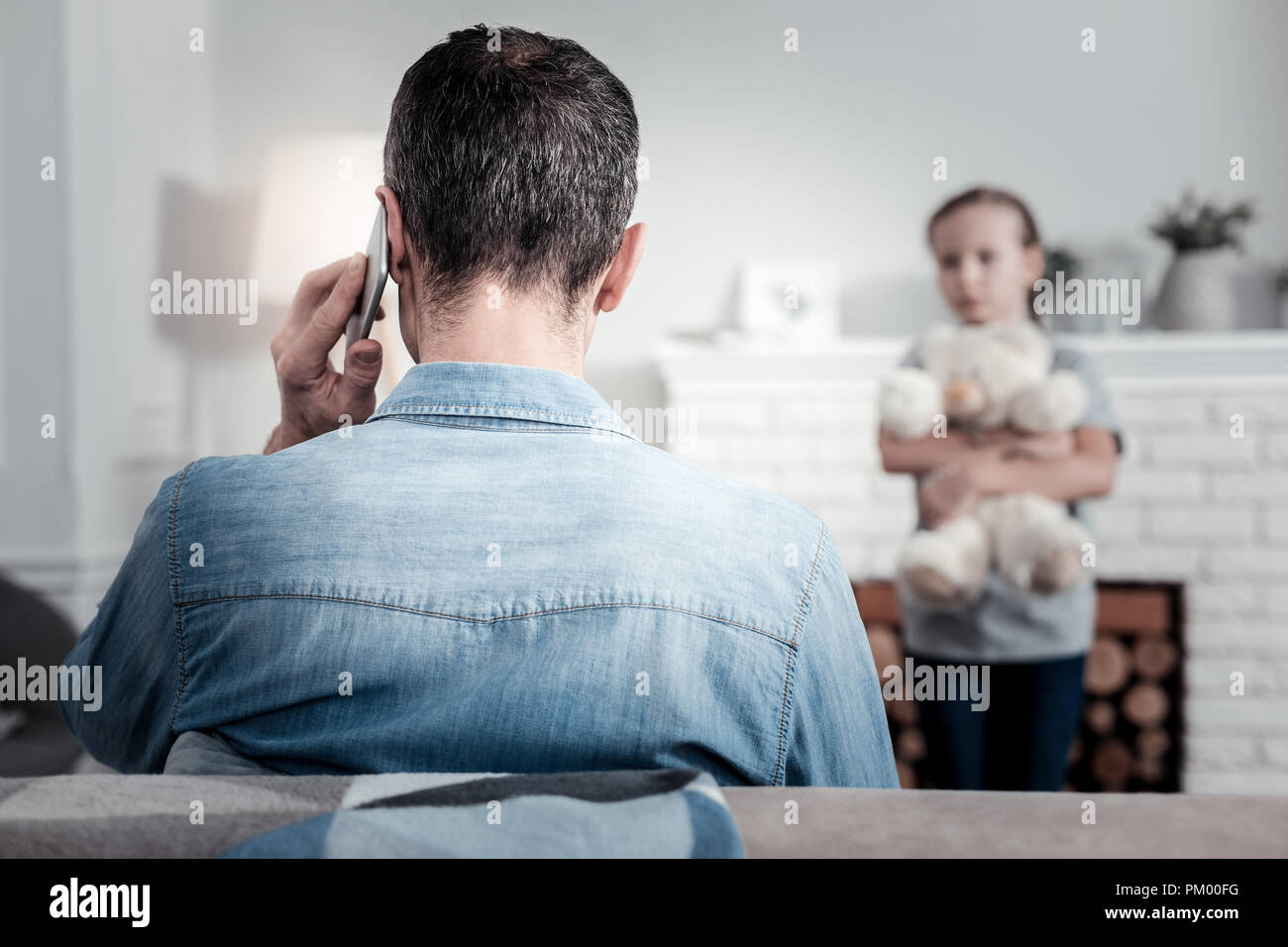 Busy man speaking on the phone Stock Photo