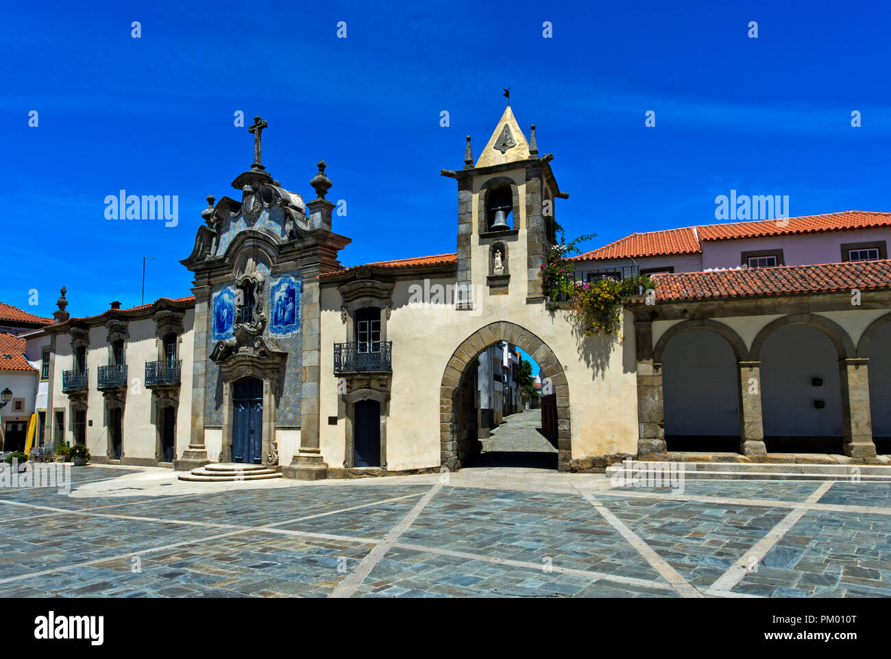 Chapel of Mercy, Capela da Misericórdia, and city gate, Sao Joao da Pesqueira, Portugal Stock Photo