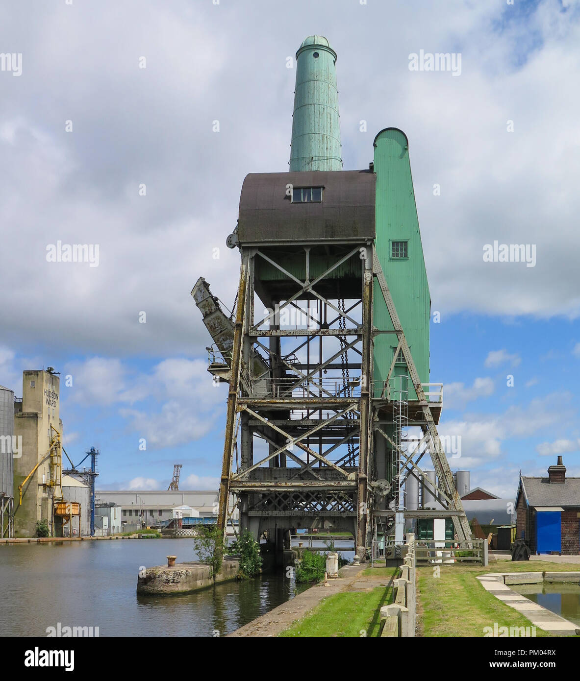 A 'Tom Pudding' hoist at Yorkshire Waterways Museum in Goole, Yorkshire, UK. For lifting tub boats full of coal to empty them into ships or barges. Stock Photo