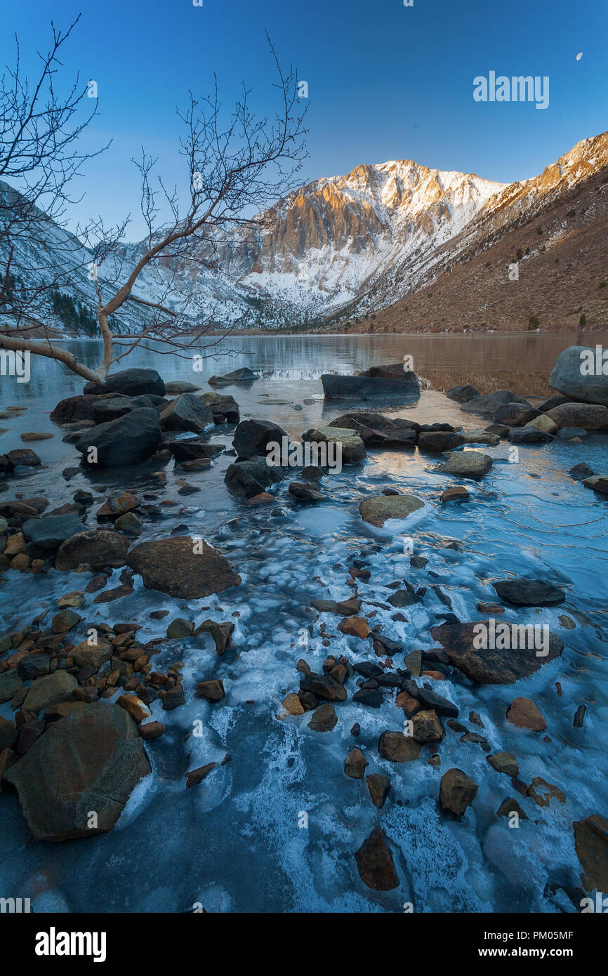 Cold Morning at Convict Lake With Frozen Shore Stock Photo