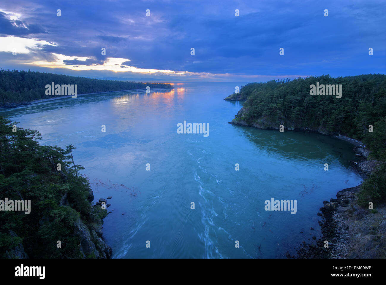 The Deception Pass During a Cloudy Sunset Stock Photo
