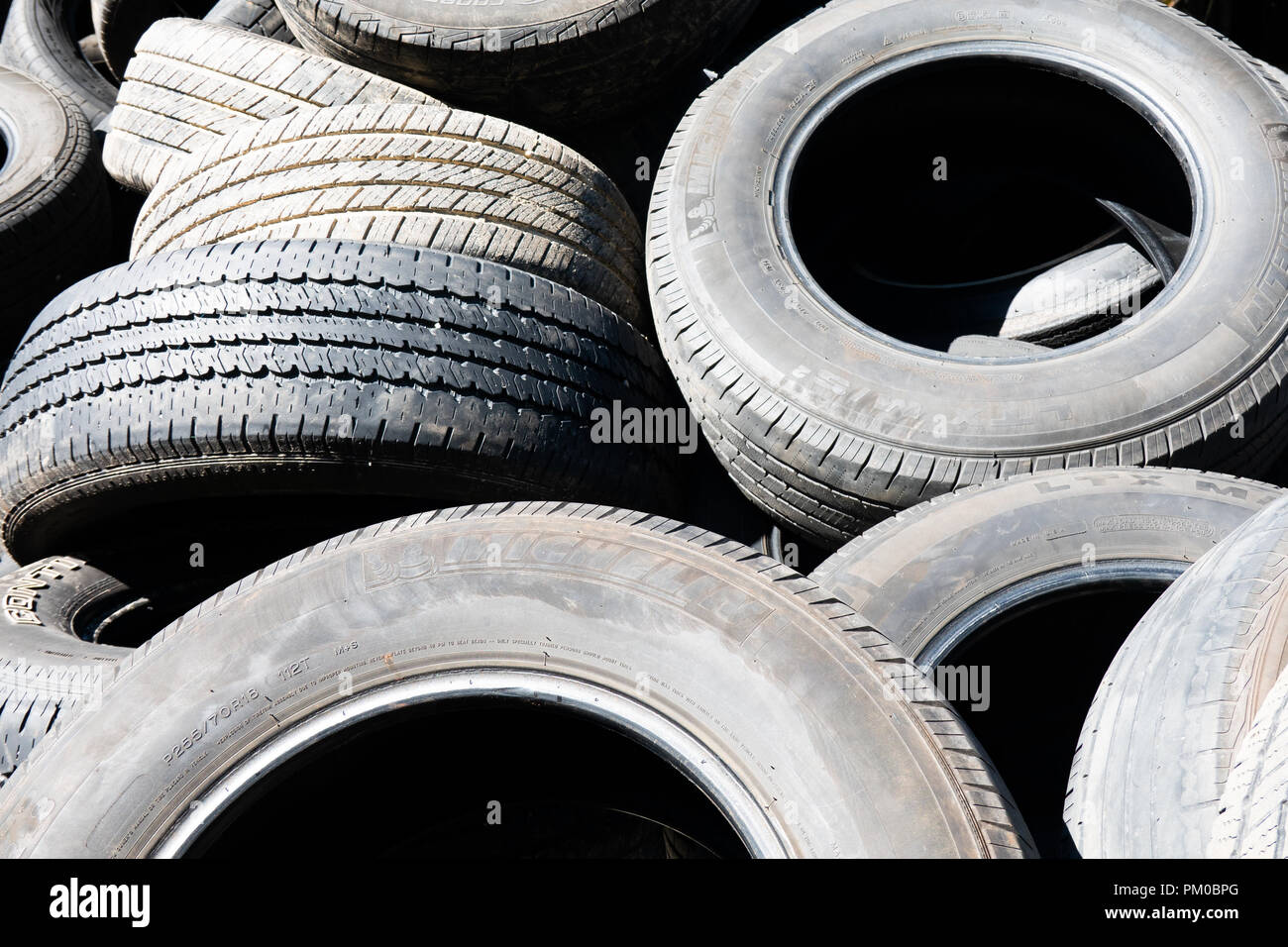 A pile of used worn discarded tires for recycling in Upstate New York