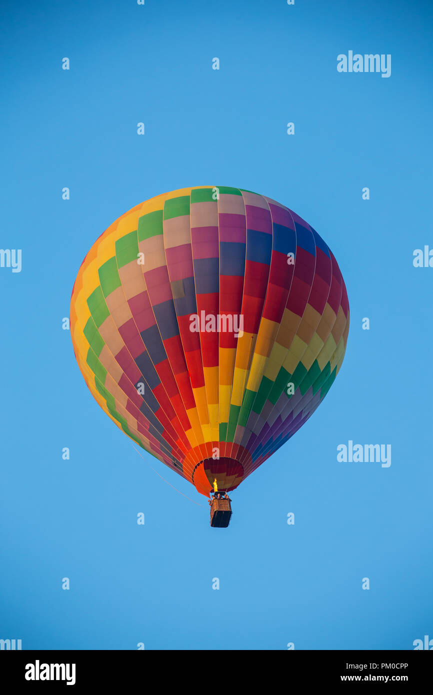 Hot air balloon high in the sky Stock Photo - Alamy