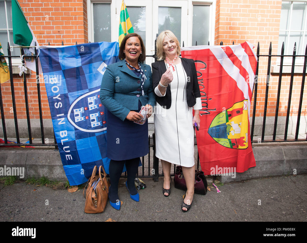 Sinn Fein President Mary Lou McDonald (left) and MEP Liadh N’ Riada on their way to watch an All-Ireland Ladies Football Final between Dublin and Cork at Croke Park Dublin, following a press conference in Dublin, where it was confirmed that Liadh will be the party's candidate in the Irish presidential election. Stock Photo