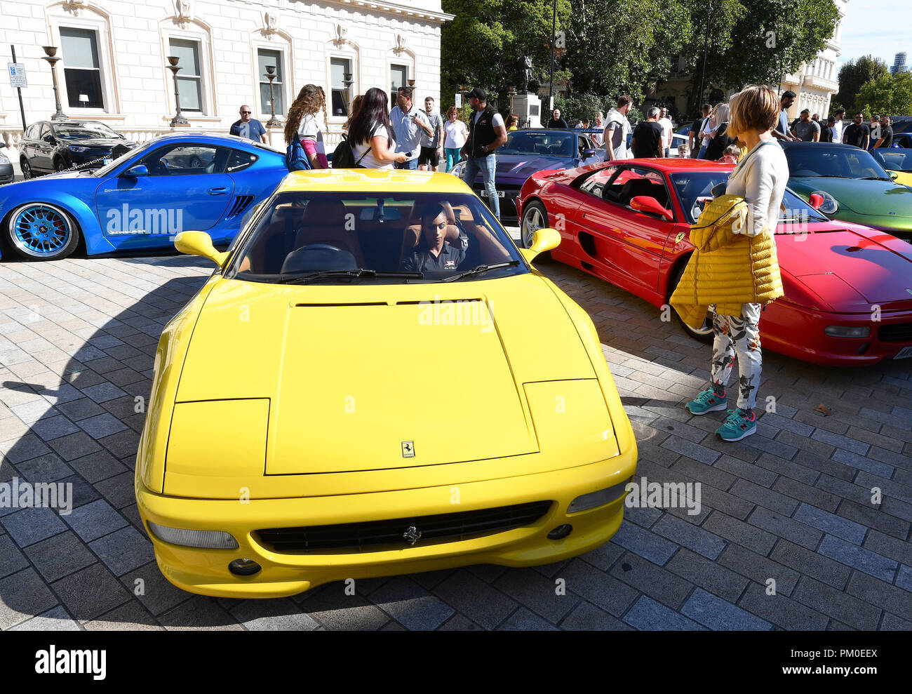 Supercars parked in Waterloo Place, London, where the Piccadilly Boy ...