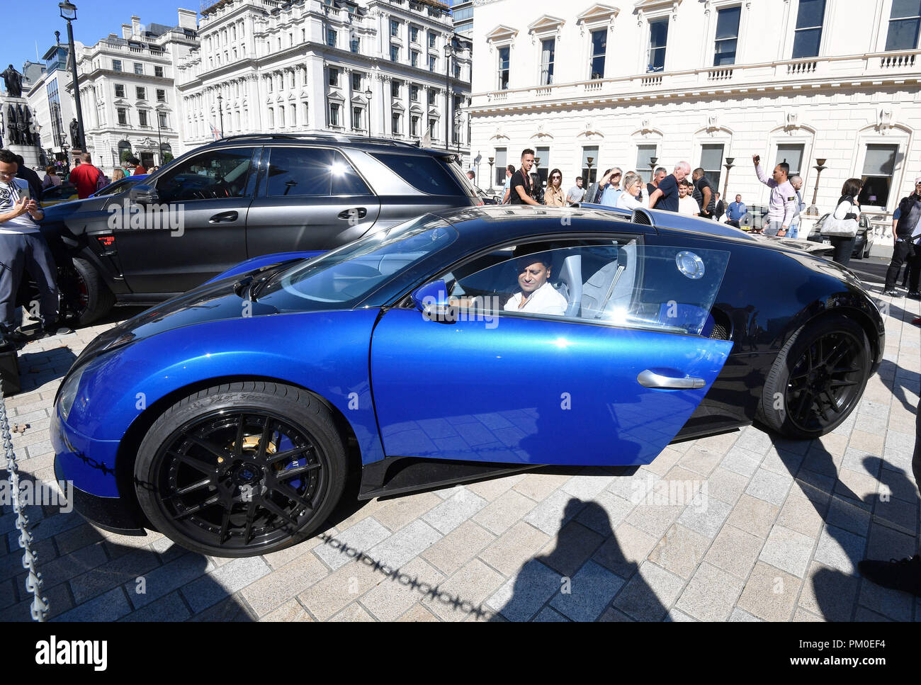 Supercars parked in Waterloo Place, London, where the Piccadilly Boy ...