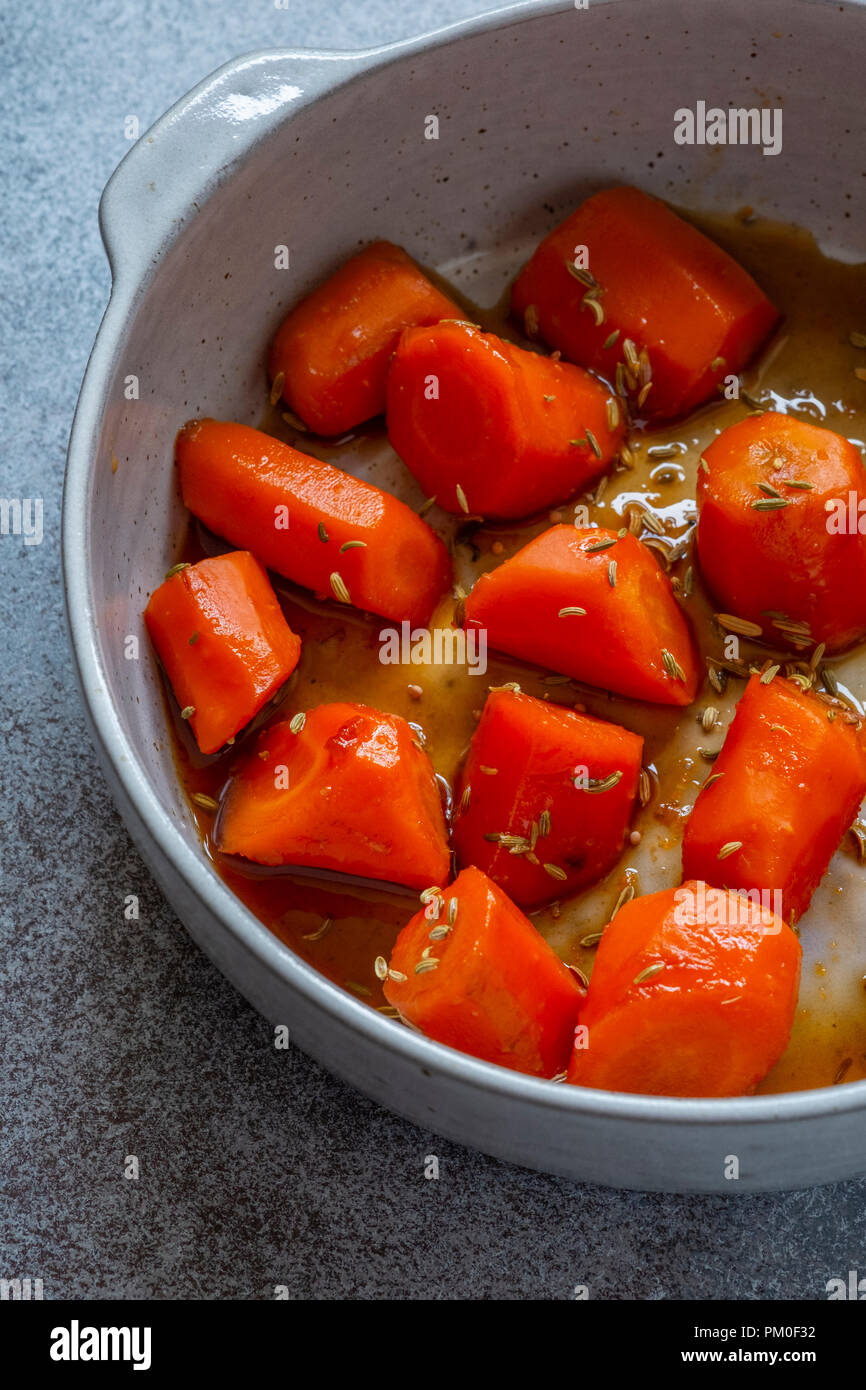 Carrots in Copper Pan Stock Photo