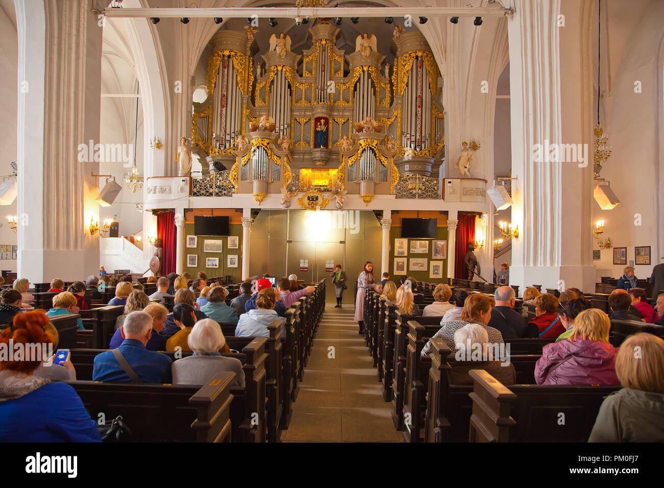 KALININGRAD, RUSSIA - May 04.2018: People at a concert of organ music in the Cathedral Stock Photo