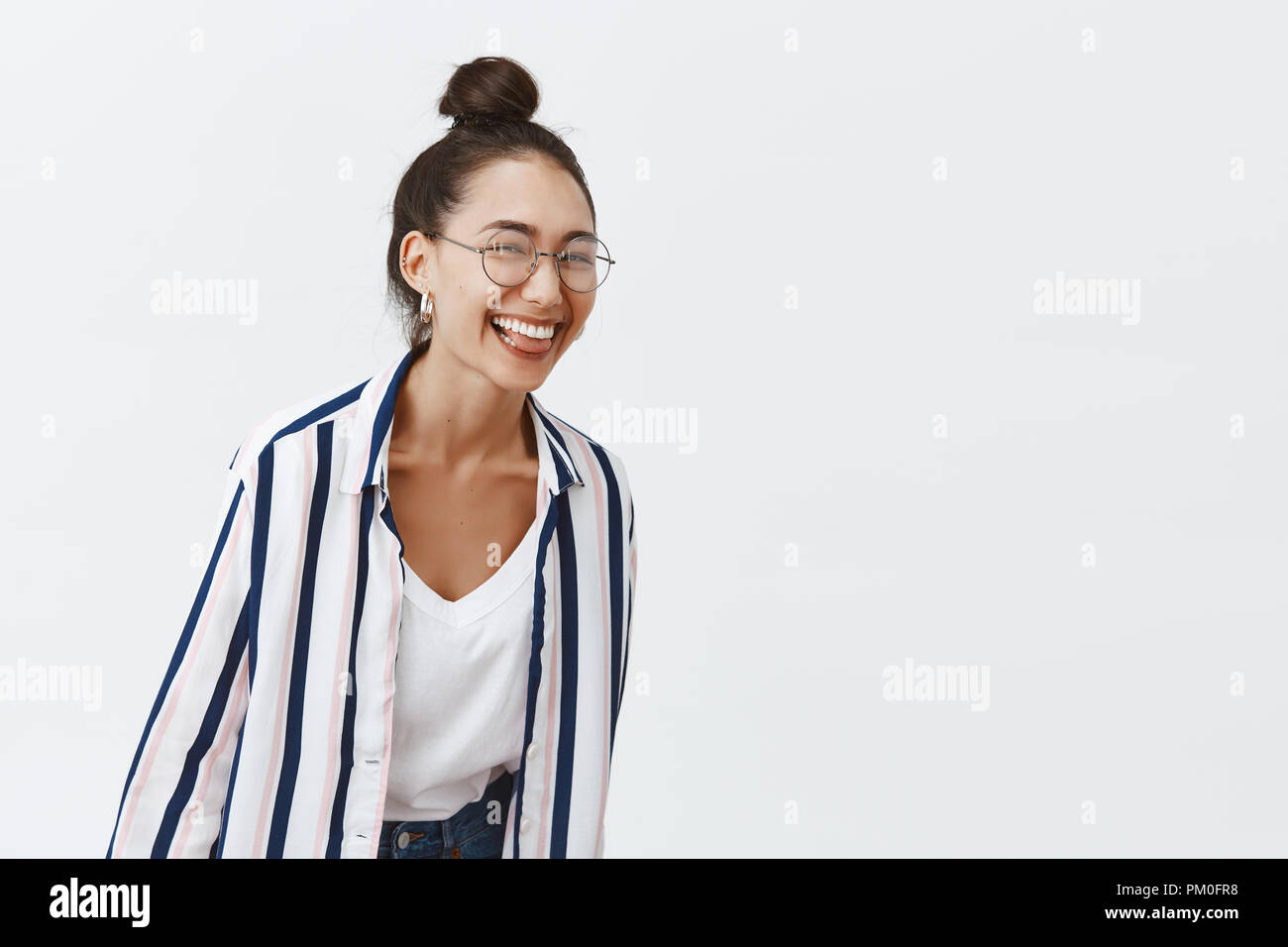 Woman bending over camera hi-res stock photography and images - Alamy
