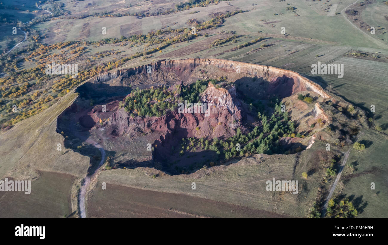 Vulcan Racos volcanic crater in Racos village. Brasov county, Transylvania, Romania ...