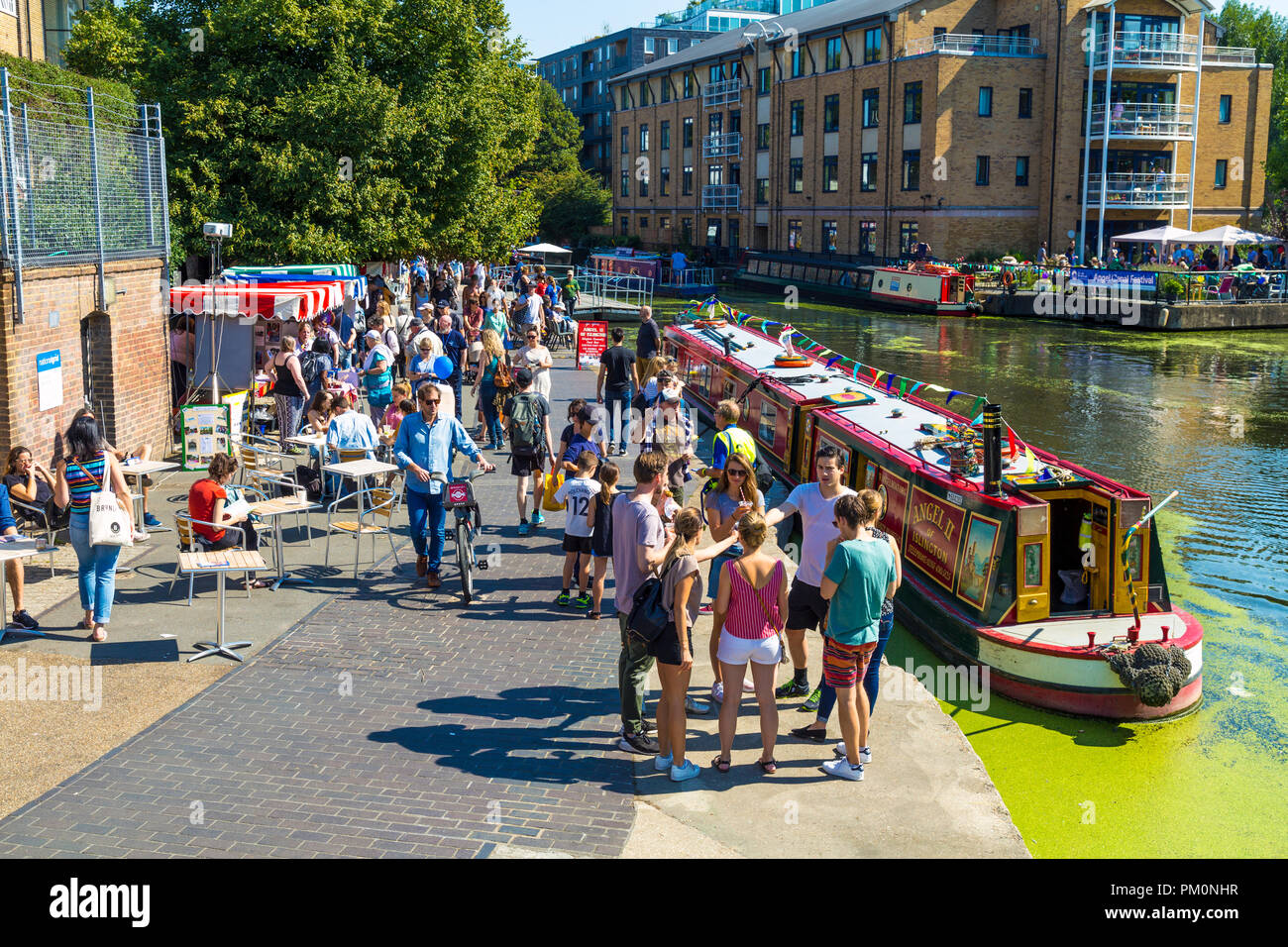 People walking along the Regents Canal at Angel Canal Festival, London, UK Stock Photo