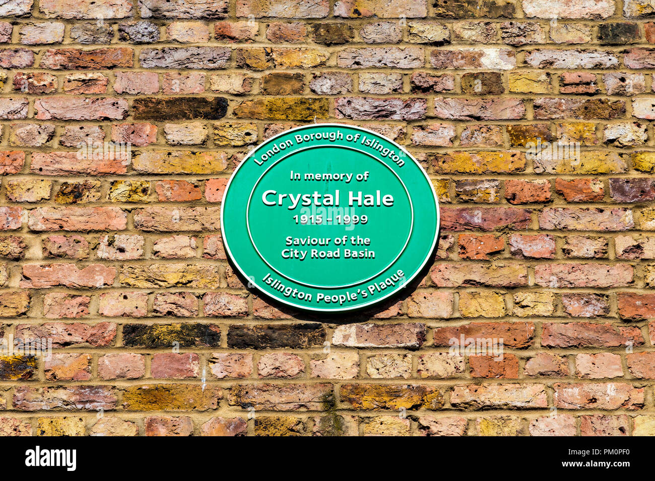 A green Islington People's Plaque for Crystal Hale, saviour of City Road Basin on the Regents Canal, London, UK Stock Photo