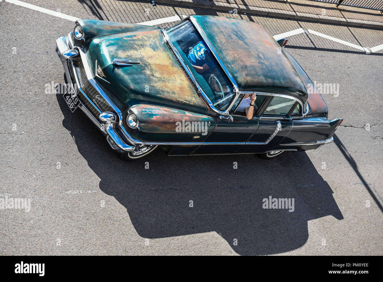 Rusty 1956 Cadillac old vintage classic sedan car arriving for Classic cars on the Beach car show on Southend seafront. American automobile Stock Photo