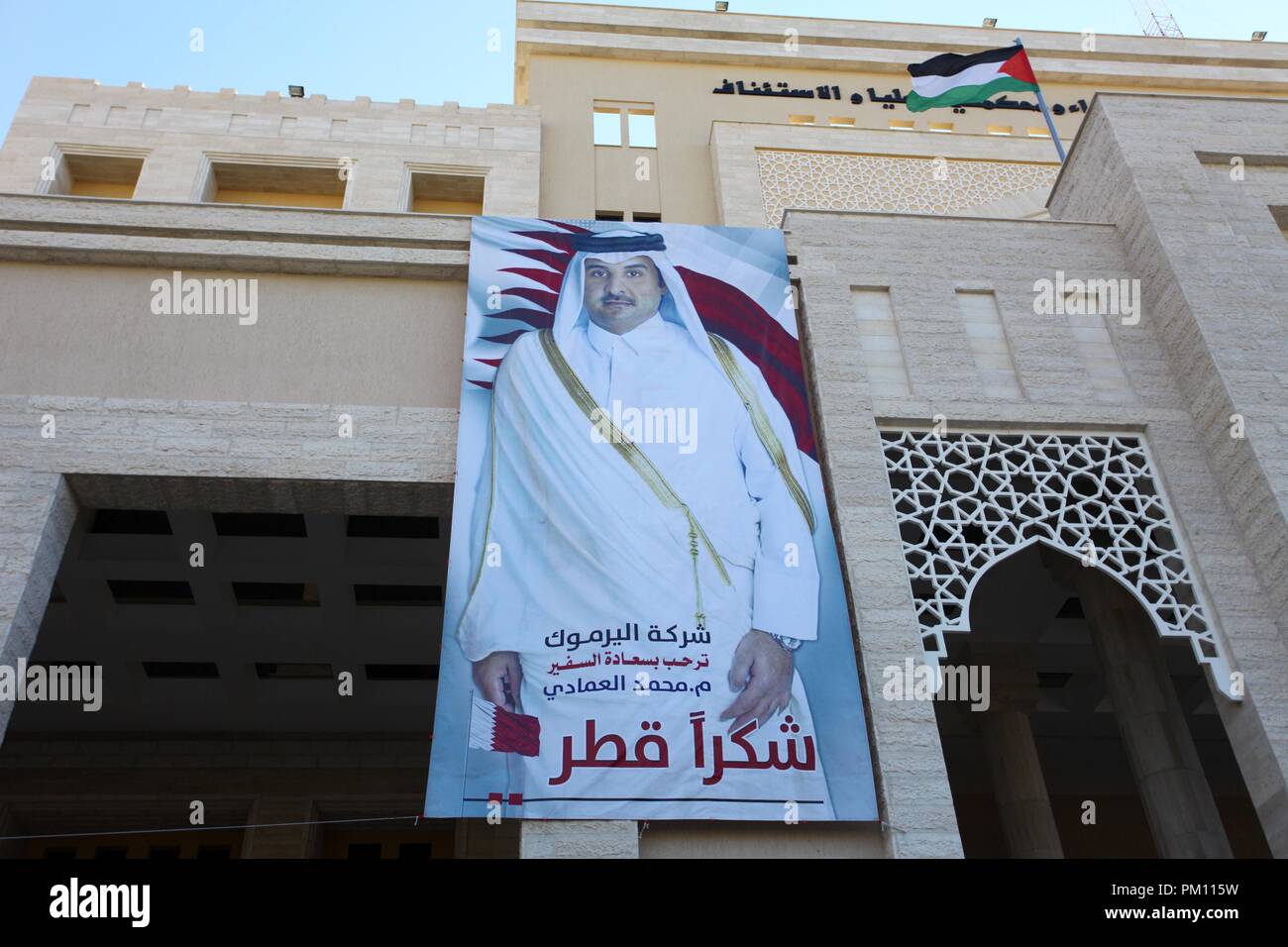 gaza-city-gaza-strip-palestinian-territory-16th-sep-2018-a-picture-taken-on-september-16-2018-shows-a-poster-of-emir-of-qatar-sheikh-tamim-bin-hamad-al-thani-placed-on-new-headquarters-of-the-superior-committee-of-justice-which-was-funded-by-qatar-in-south-of-gaza-city-credit-mahmoud-ajourapa-imageszuma-wirealamy-live-news-PM115W.jpg