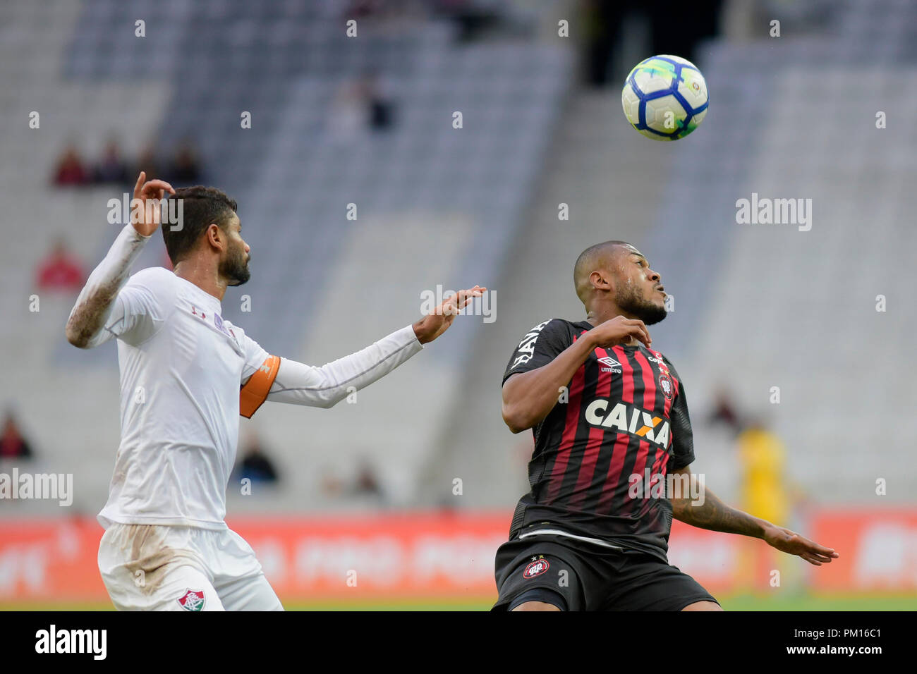 Curitiba, Brazil. 16th Sep, 2018. Gum and Marcelinho during Atlético PR x Fluminense RJ, match valid for the 25th round of the Brazilian Championship 2018. Arena da Baixada. Curitiba, PR. Credit: Reinaldo Reginato/FotoArena/Alamy Live News Stock Photo