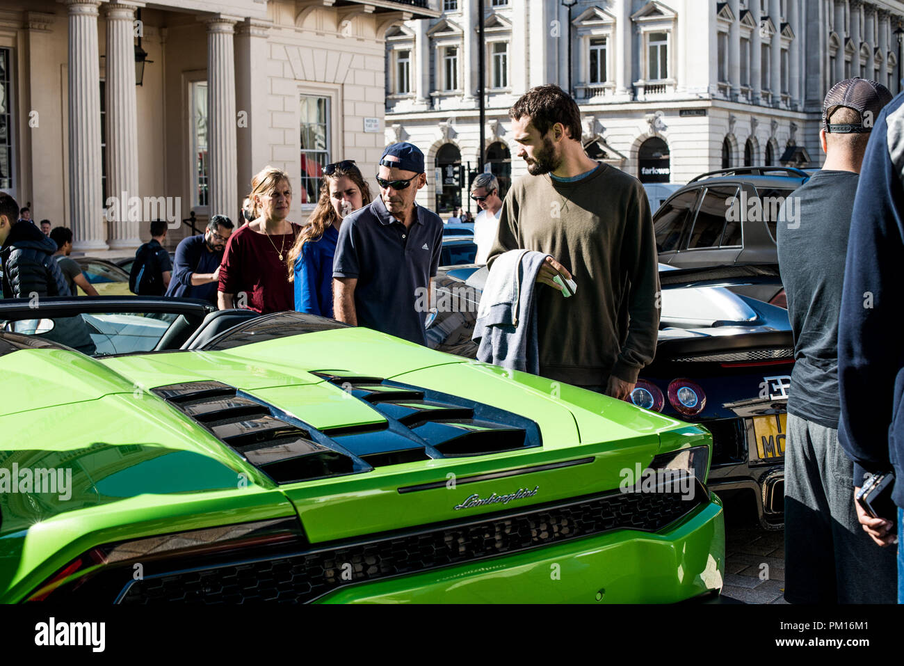 People Seen Admiring Super Cars Lined Up During The Show Piccadilly Boys The Super Car Racer Club Of Kream Development Parades Their Customized Car In The Kream Liberty Walk M3 Edition At