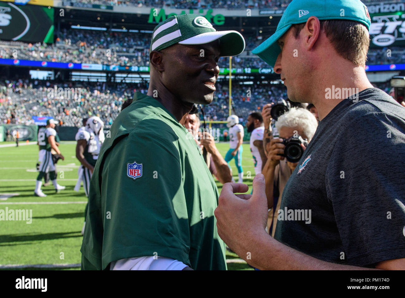 East Rutherford, NJ, USA. 16th Sep, 2018. New York Jets head coach Todd  Bowles and Miami Dolphins head coach Adam Gase shake hands after the game  between The New York Jets and