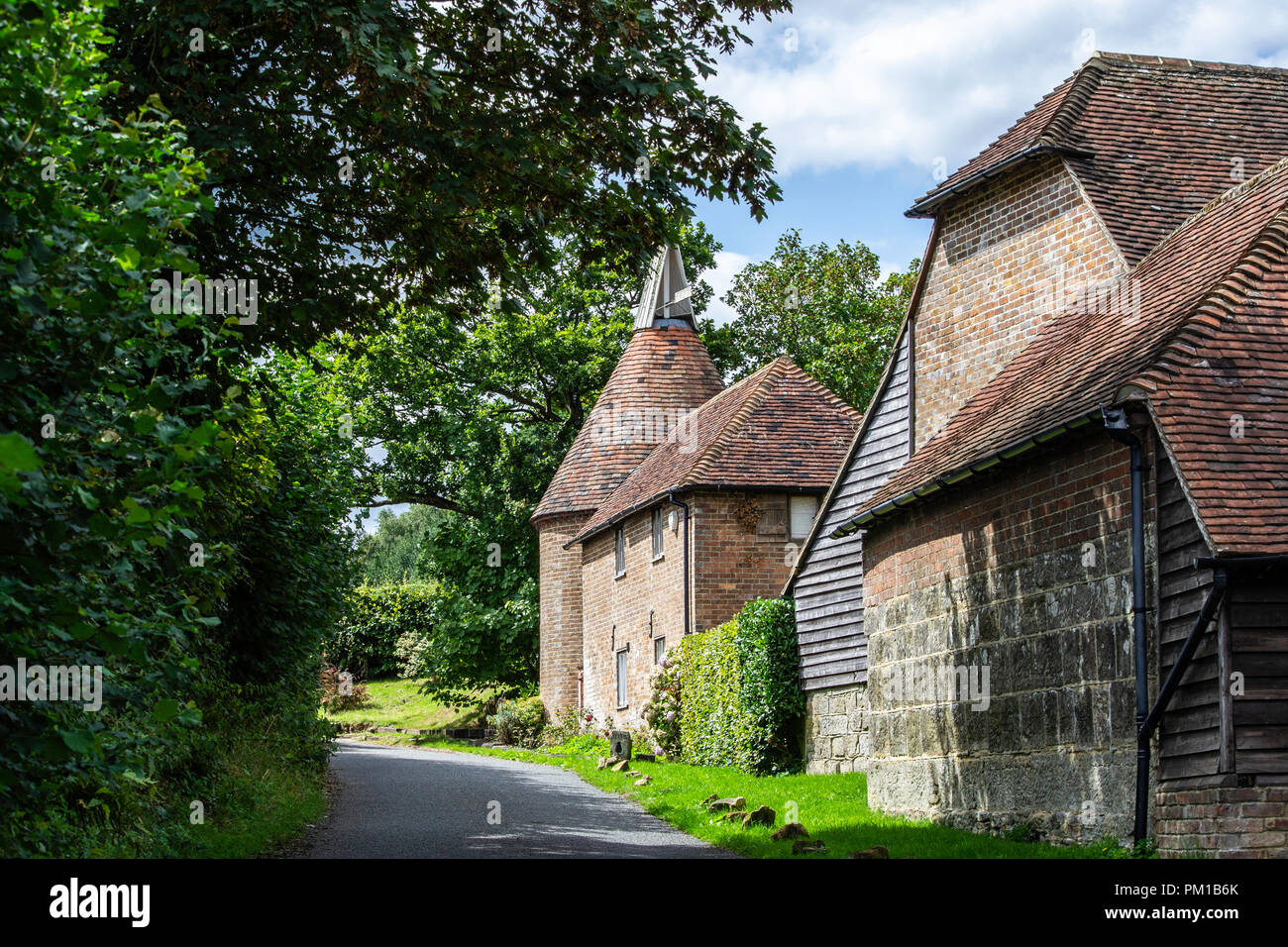 A traditional oast house on a country lane Stock Photo Alamy