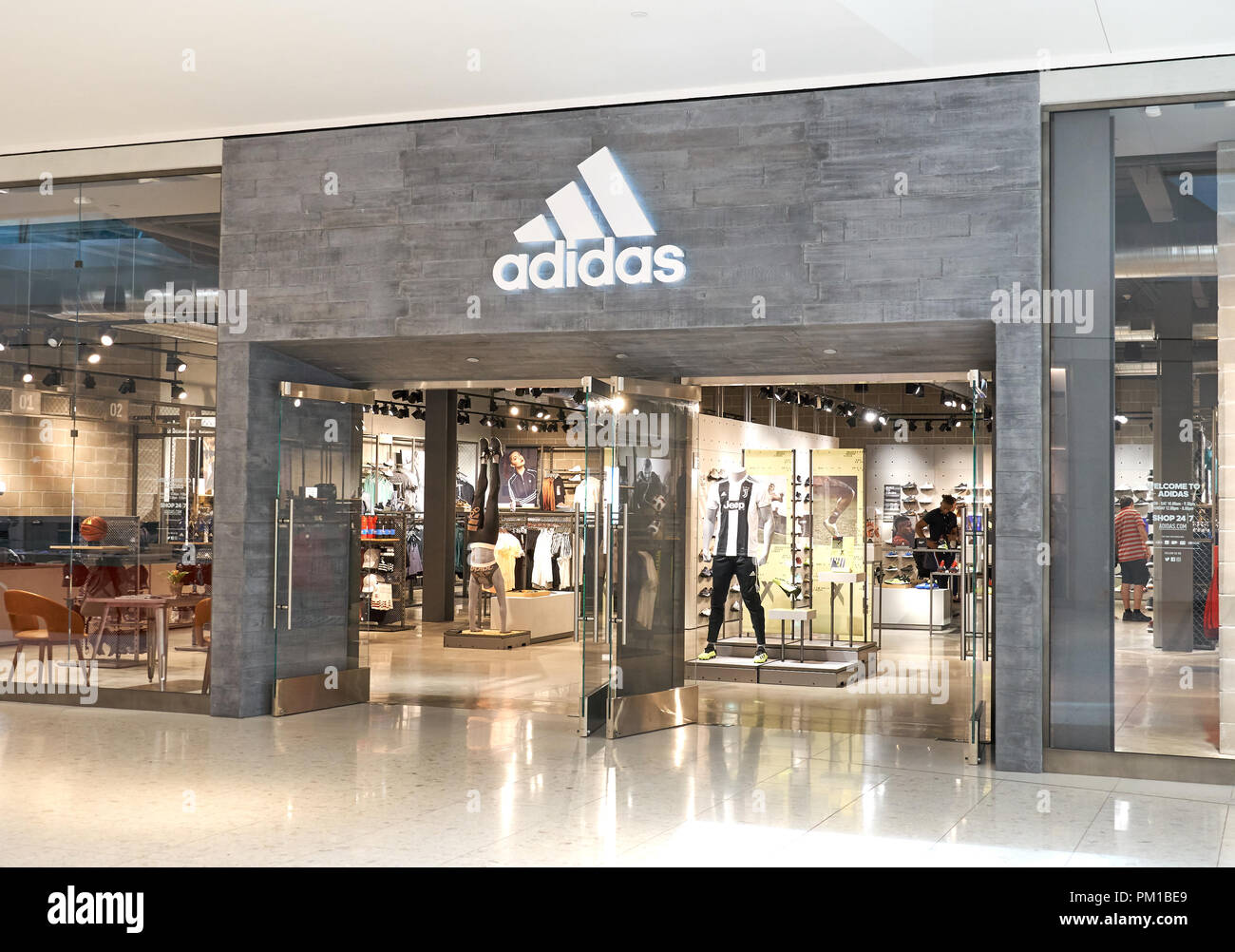 AVENTURA, USA - AUGUST 23, 2018: Adidas famous boutique in Aventura Mall.  Adidas is a multinational corporation that designs and manufactures shoes,  c Stock Photo - Alamy