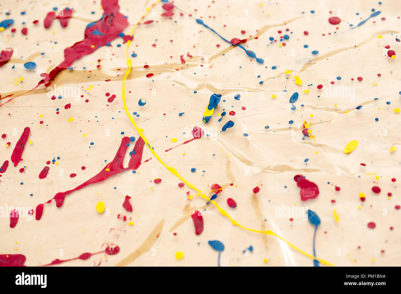 Background splattered with colourful paint Stock Photo