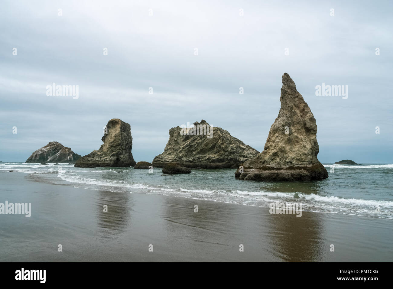Bandon Beach sea stacks or rocky outcrops on an overcast day, Oregon Coast, USA. Stock Photo
