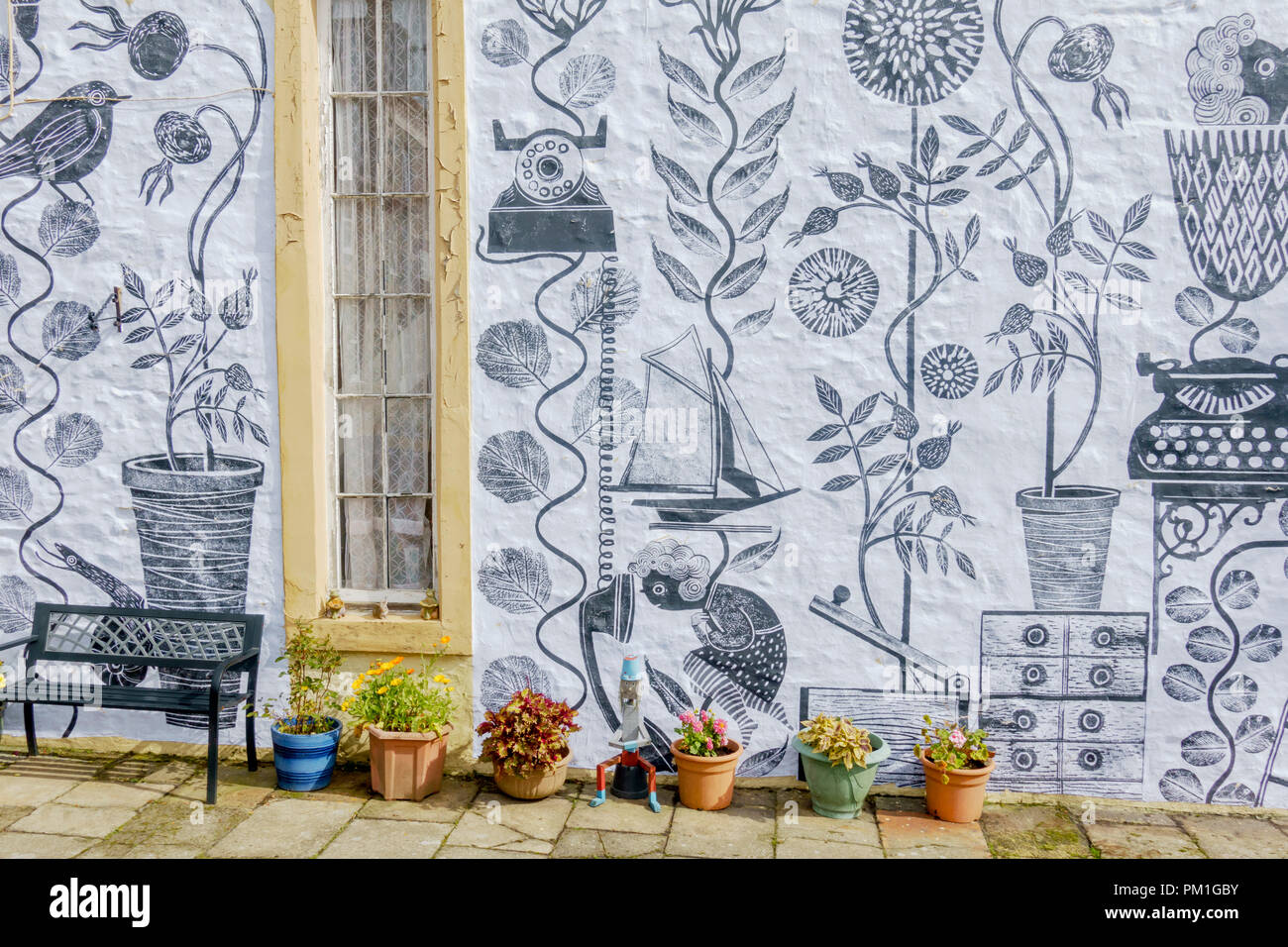 Artist Astrid Jaekel has wallpapered the outside of several buildings in Wigtown for the town’s Annual Book Festival 21-30 Sept 2018. Stock Photo