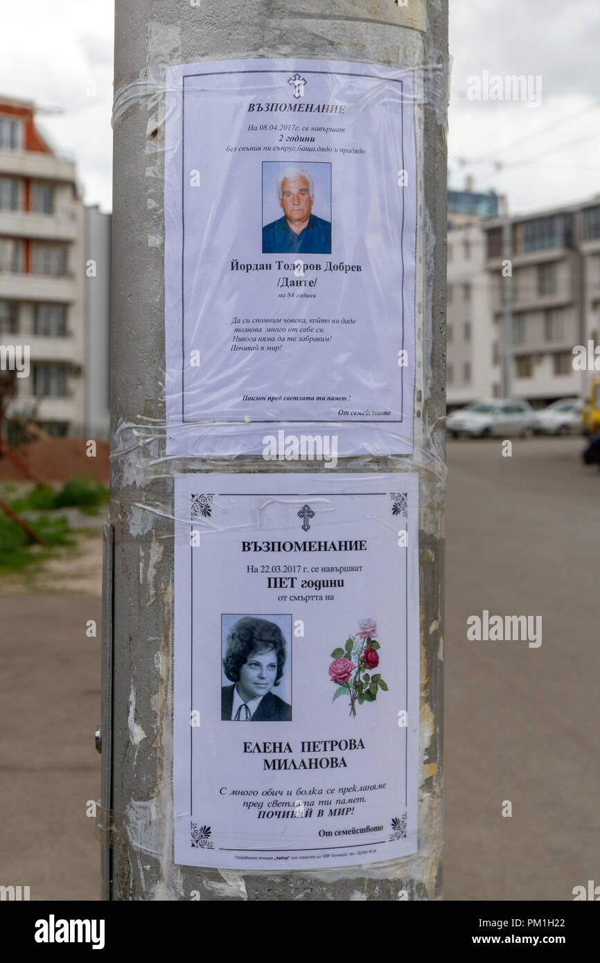 Memorial notices (death notices or necrologs) on a post in Sofia, Bulgaria. Stock Photo