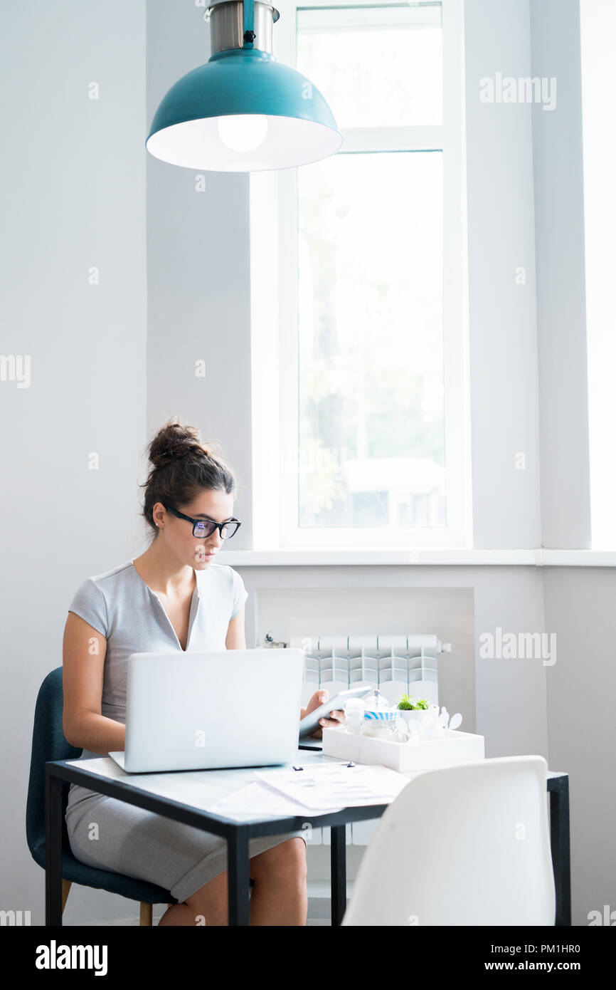 Successful Businesswoman Working in Cafe Stock Photo