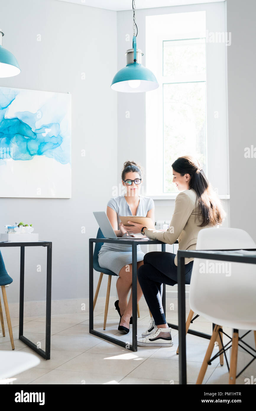 Two Businesswomen Meeting in Cafe Stock Photo - Alamy