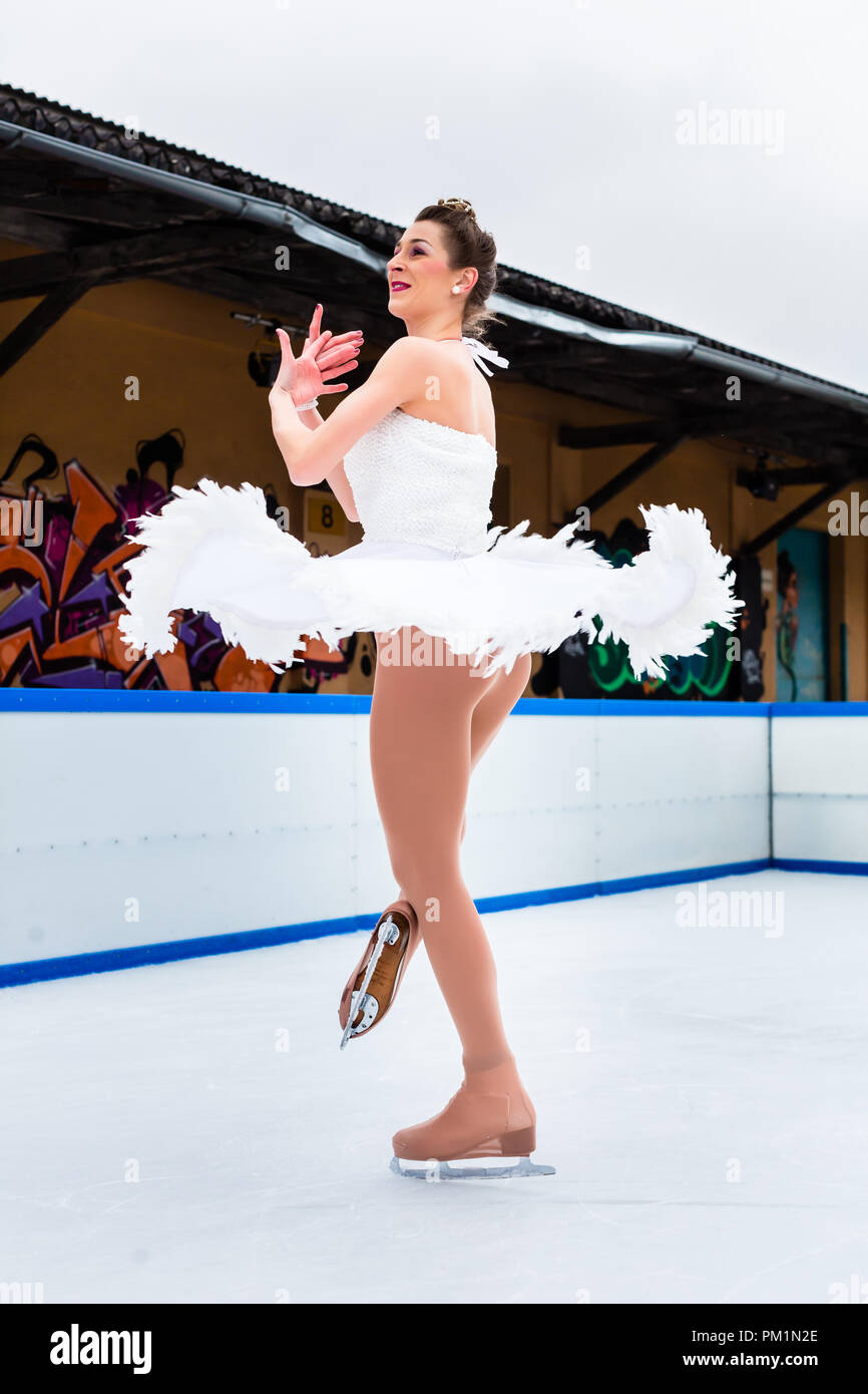 Elegant figure ice skater on ice rink Stock Photo Alamy