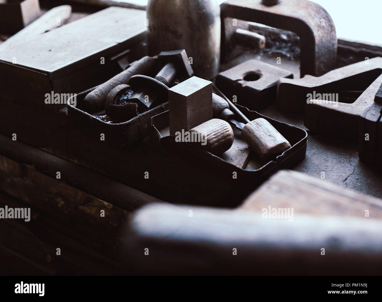 Former Work Things work place with utensils in an old factory Stock Photo - Alamy