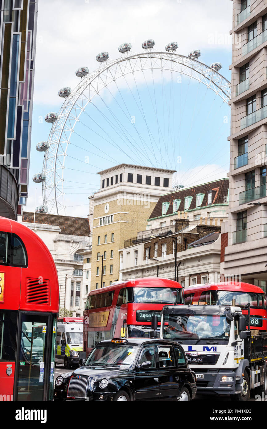 London England,UK,South Bank,Lambeth,Westminster Bridge Road,skyline,view,London Eye Ferris wheel,street traffic,red double-decker bus,taxi,traffic ja Stock Photo